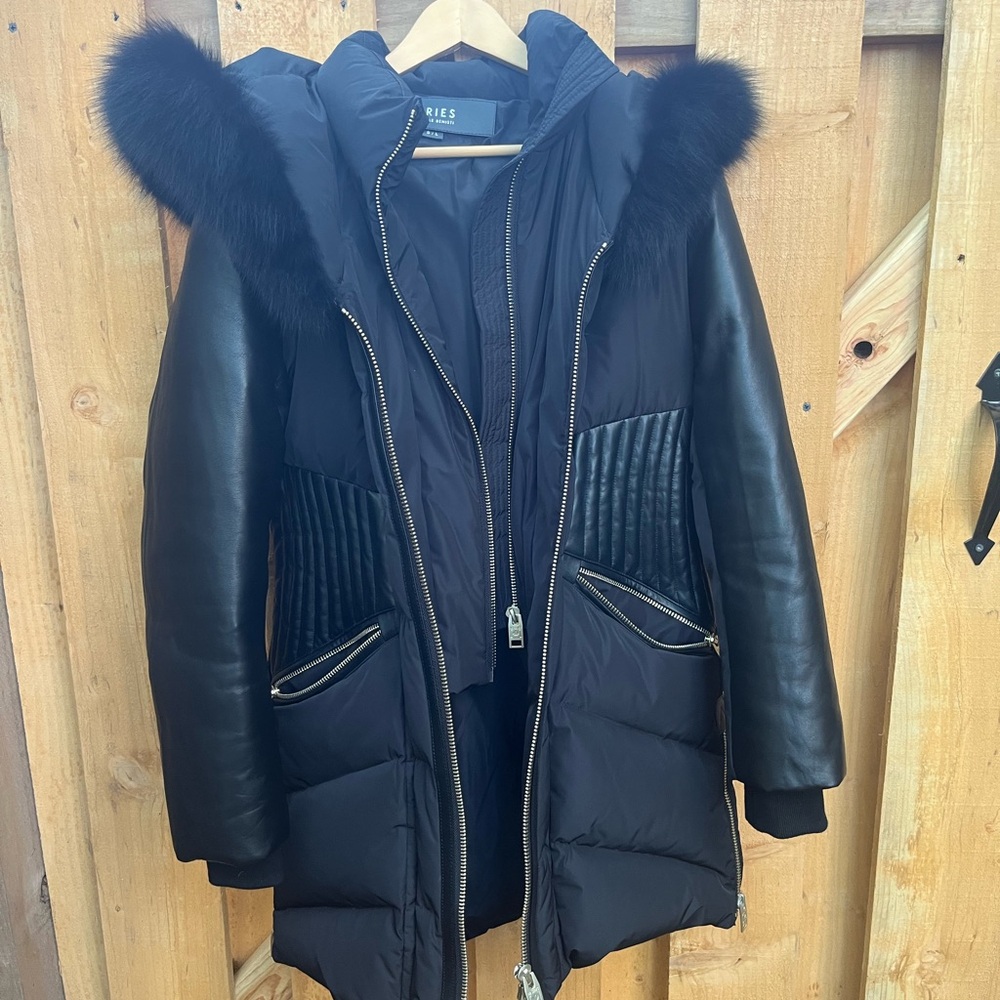 From the Series by Nicole Benisti Collection. Canadian outwear. Fur hood trim.